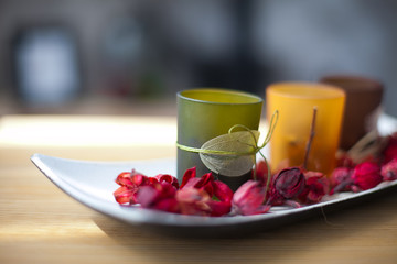The decor. candles with rose petals