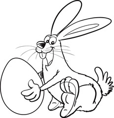 Happy Easter! Easter bunnies and egg in field