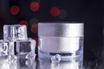 Black blank cream package on a dark background. 3d cosmetic make up cream. 3d rendering. Cosmetic cream container. Jar of cream for the face for your design