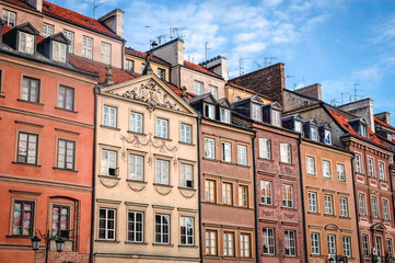 Fototapeta na wymiar Row of tenement houses on the Old Town Market Place in Warsaw city