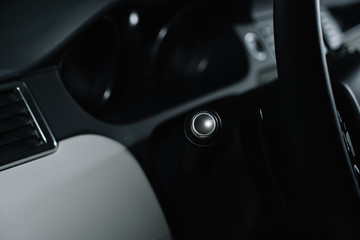 Obraz na płótnie Canvas selective focus of button on signal switch in car