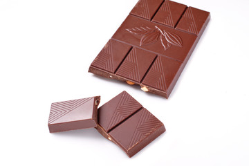 chocolate with almonds on white background