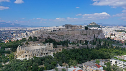 Fototapeta na wymiar Aerial drone photo of iconic propylaia and the Parthenon in Acropolis hill, masterpiece of ancient world, Athens historic centre, Attica, Greece
