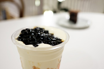 Bubble tea with ice creamy caramel tea. Milk boba tea Taiwan milk tea beverage.