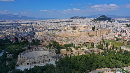 Fototapeta na wymiar Aerial drone photo of iconic propylaia and the Parthenon in Acropolis hill, masterpiece of ancient world, Athens historic centre, Attica, Greece