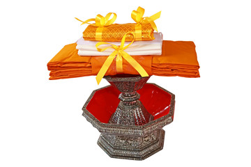 Kathin fabric, Kathin ceremony, Buddhist monk dresses in a carved tradition pearl tray with...