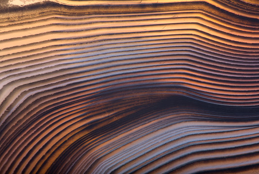 lines of orange agate macro texture - Powered by Adobe