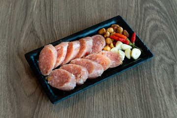 Spicy fermented pork salad ( Yum naem ) 