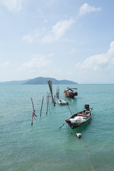 Fototapeta premium Kayaks, boats, canoes at the sea. A beautiful view of the sea. Thong Kut Beach. Koh Samui.