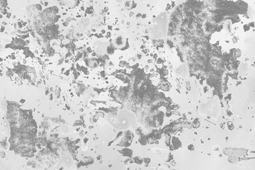 Silver, gray wet abstract paint leaks and splashes texture on white watercolor paper background. Natural organic shapes and design.