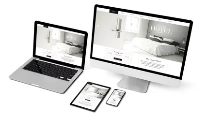 Foto op Plexiglas devices collection showing grand hotel website © MclittleStock