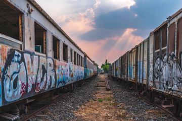 Fototapeta na wymiar Old train wrecks that were left waiting for repairs