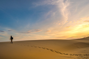 Fototapeta na wymiar Explorer hiking on a desert