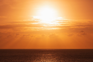 orange sun at ocean seascape