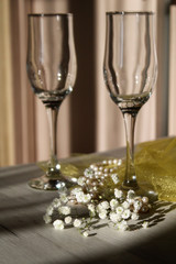 two glasses of champagne on table