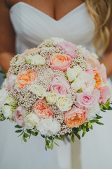  bride holds a bouquet 