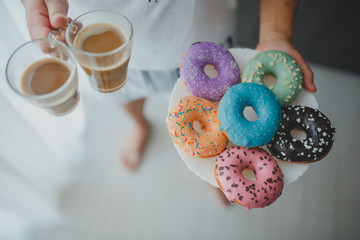 man brought keeps donuts and coffee