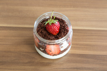 Strawberry Magnolia Dessert on the wooden table for concept.