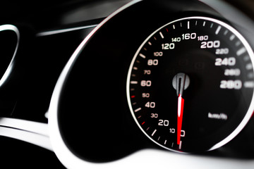 Luxury car steering wheel and dashboard with monitor.