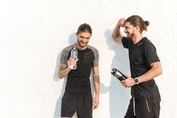 Two healthy fit twin brothers exercising outdoors