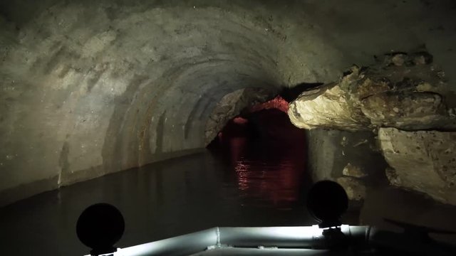 mysterious smooth river path in the stone cold cave of Prometheus, the path to the kingdom of dead souls and the other world of spirits, feel like fabulous hero in Greek mythology