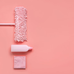 MOP, rag and detergent-pink set for spring cleaning. Top view. Place for text.