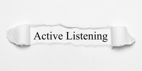 Actice Listening on white torn paper