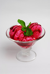 Ice cream in a glass, on a gray background