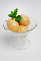 Ice cream in a glass, on a gray background