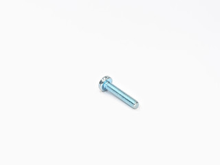 Zinc plated metric pan phillips round head screw bolt on white. 