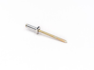 Aluminum flat pop rivet with zinc plated mandrel on white.
