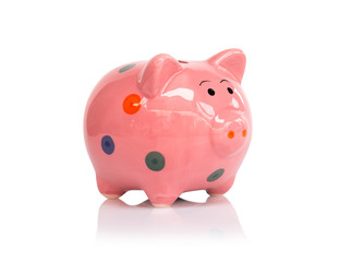 Pink ceramic piggy bank on white background, saving money concept