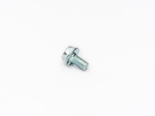 Hexagon non spinning flange head metric thread screw bolt on white.