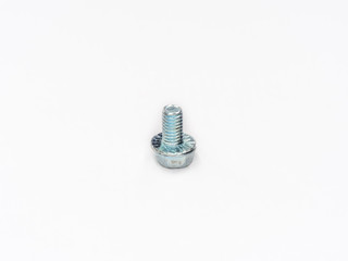 Hexagon non spinning flange head metric thread screw bolt on white.