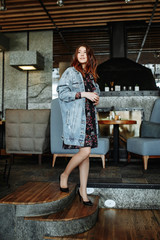 Passion young girl wearing stylish blue dress for the evening party.