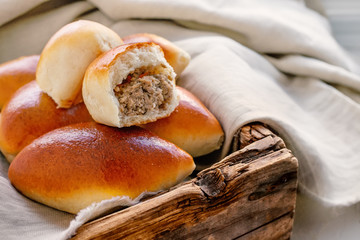 Freshly baked fragrant homemade small meat patties with an appetizing crust