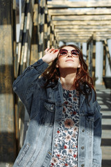 Fototapeta premium Fashion portrait stylish pretty woman in sunglasses outdoor.