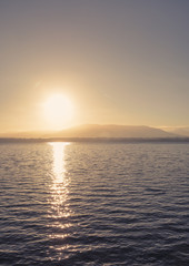 Sun rays reflecting off the water level.