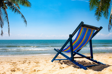View of the chair on the beach, blue sky Summer vacation concept Consists of travel websites