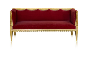 Ancient golden sofa isolated on white background