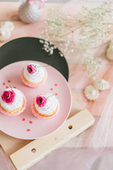delicious cake and cupcakes in a beautiful decor makes pastry chef