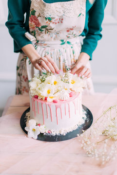 delicious cake and cupcakes in a beautiful decor makes pastry chef