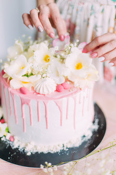 delicious cake and cupcakes in a beautiful decor makes pastry chef