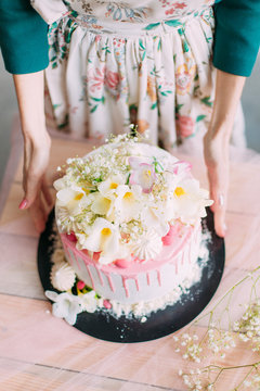 delicious cake and cupcakes in a beautiful decor makes pastry chef