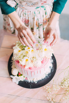 delicious cake and cupcakes in a beautiful decor makes pastry chef