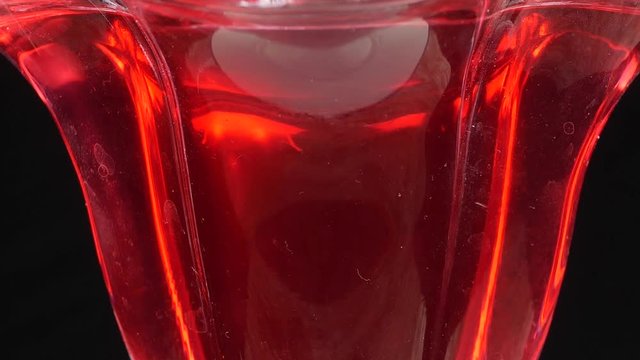 Tasty red jelly in bowl. red substance in a glass bowl