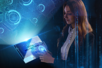The concept of business, technology, the Internet and the network. A young entrepreneur working on a virtual screen of the future and sees the inscription: Data protection