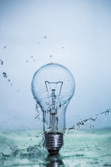Bulb lamp with motion freezed water splashes.