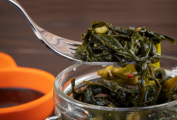 sea ​​kale salad on a fork close up