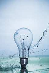 Bulb lamp with motion freezed water splashes.